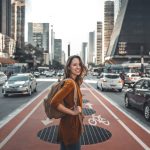 woman standing on middle of road